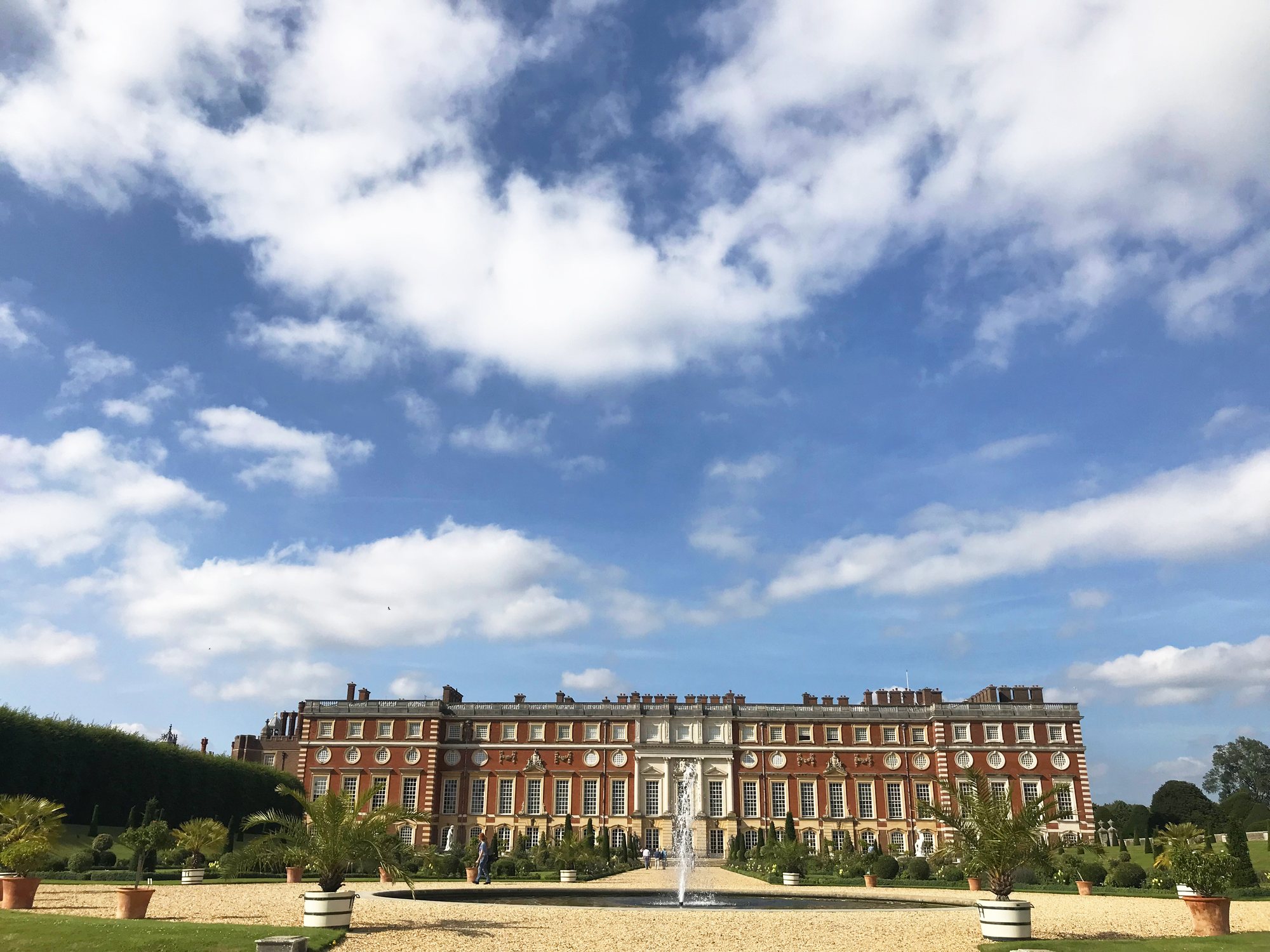 The south front of Hampton Court Palace seen across its formal gardens